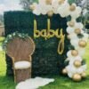 white and green themed baby shower balloon garland