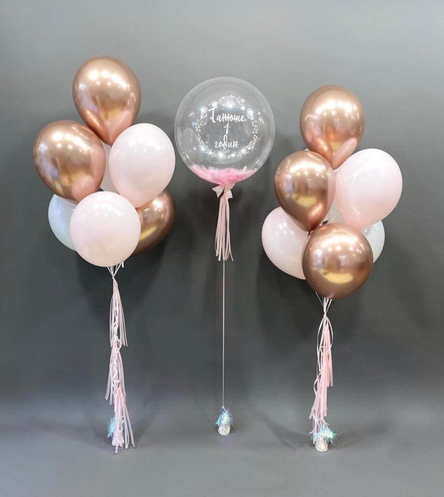 white and gold balloons with air balloon for decoration