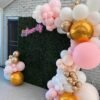 rose, gold and white themed balloon backdrop for party