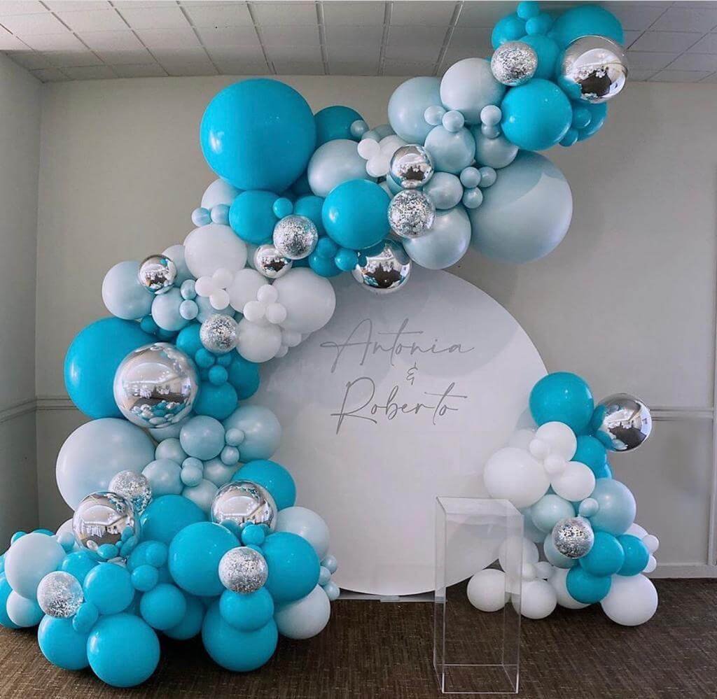 Blue white and silver arch shaped balloon backdrop