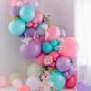 multicolored arch shaped balloons for birthday backdrop