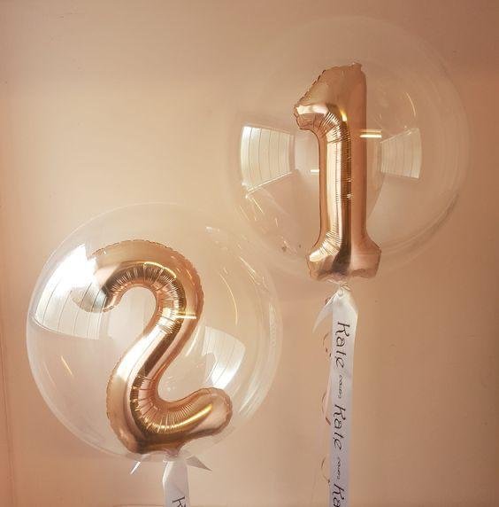 hot air bubble balloon with digits inside it for celebration