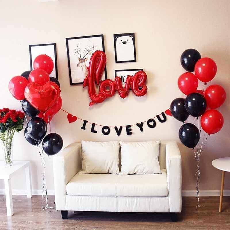 red and black themed balloons with heart and numbered foil balloons for valentine's day