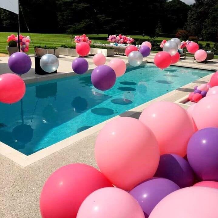 multicolored air balloons for poolside decoration