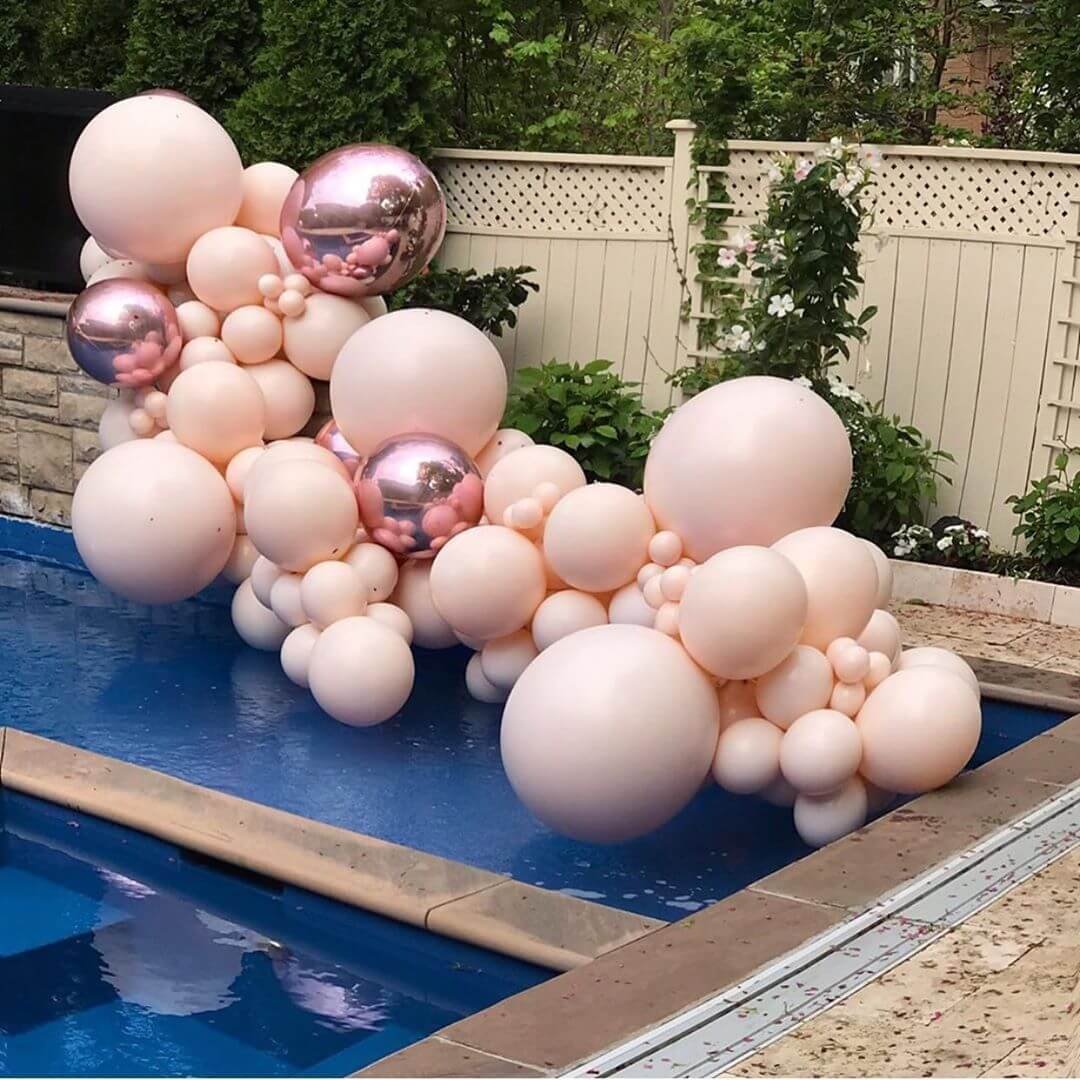 rosegold and cream color themed balloons