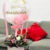 Rose colored hot air balloons and beautiful flower gift hamper