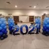 blue and black balloon piller set for corporate ceremony