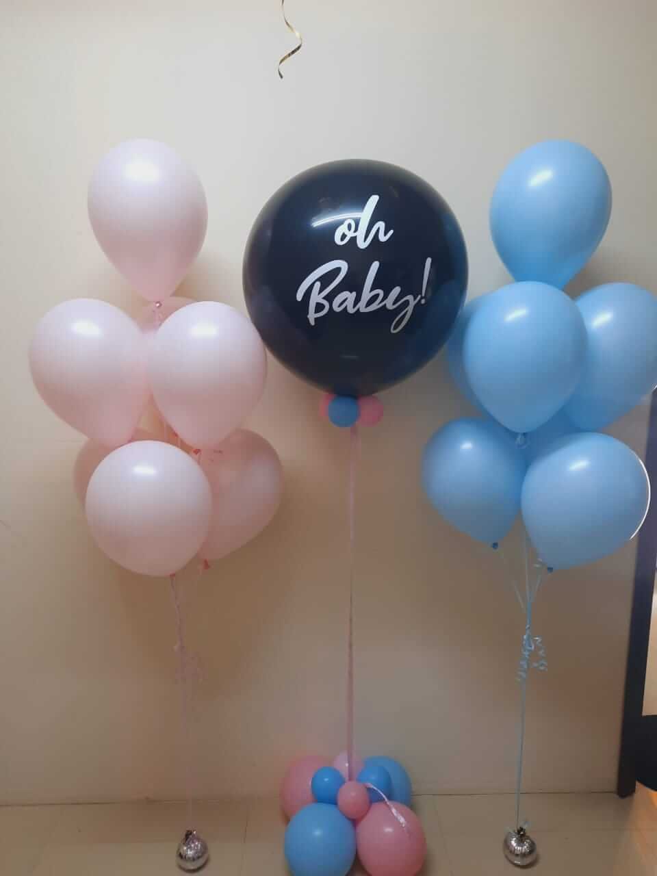 Gender reveal blue and pink colored themed ballloons