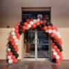 multicolored balloon arch for corporate opening ceremony