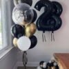 black,gold and white customized balloon bouquet for birthday with numbered foil balloon