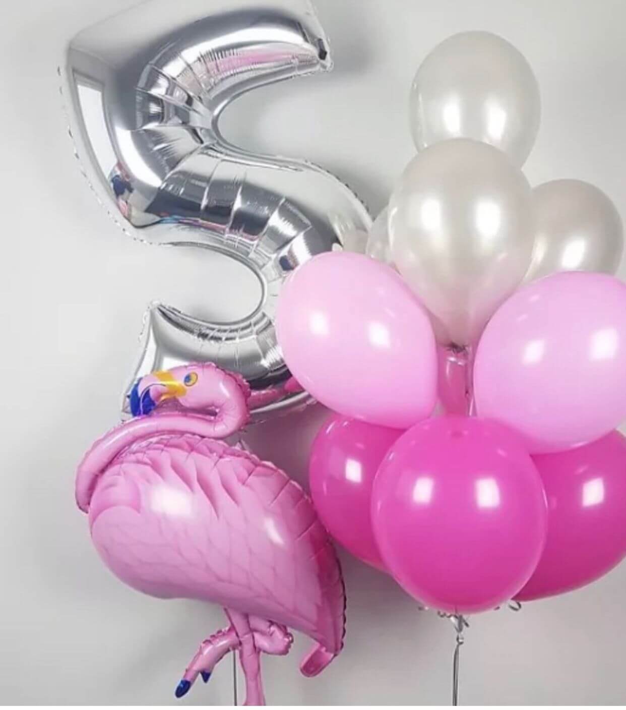 rose and white themed balloons with numbered foil balloons